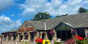 Exterior and Landscaping at TJ's Bar and Restaurant at Park Foot Holiday Park in Pooley Bridge, Lake District