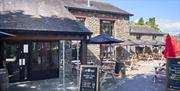 Outside Seating and Signage at Ambleside Tap Yard in Ambleside, Lake District