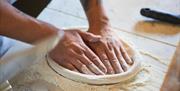 Staff Making Pizza Dough at Ambleside Tap Yard in Ambleside, Lake District