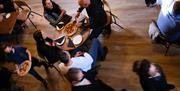 Visitors Enjoying Food and Drink at Ambleside Tap Yard in Ambleside, Lake District