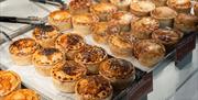 Pies on display at Tebay Services Farmshop and Kitchen in Tebay, Cumbria