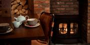 Tea and wood burner at The Ambleside Inn in Ambleside, Lake District