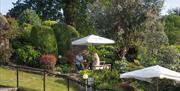 Outdoor seating and gardens at The Angel Inn in Bowness-on-Windermere, Lake District