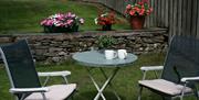 Outdoor Seating at The Coaches Cottage at Abbey Coach House Cottages in Windermere, Lake District
