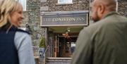 Entrance and signage at The Coniston Inn, Coniston, Lake District