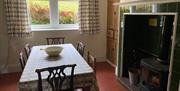 Dining Room and Wood Burner at The Coppice in Manesty, Lake District