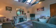 Lounge Area in The Farriers Cottage at Abbey Coach House Cottages in Windermere, Lake District