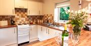 Kitchen in The Farriers Cottage at Abbey Coach House Cottages in Windermere, Lake District
