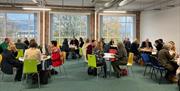 People Seated in a Function Space in The Pencil Factory in Keswick, Lake District