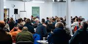 People seated in a Function Space in The Pencil Factory in Keswick, Lake District