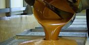 Pouring Toffee at The Toffee Shop Limited in Penrith, Cumbria