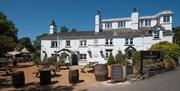 Exterior and outdoor seating at The Wateredge Inn in Ambleside, Lake District