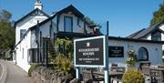 Exterior and signage at The Wateredge Inn in Ambleside, Lake District