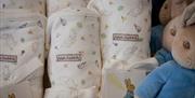 Nursery Blankets and Stuffed Animals at The World of Beatrix Potter Nursery Shop in Bowness-on-Windermere, Lake District