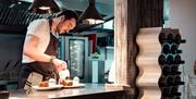 Chef Working on Dishes at The Yan at Broadrayne in Grasmere, Lake District