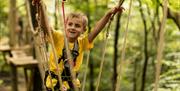 Child at Treetop Trek in Windermere, Lake District