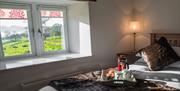 Bedroom and Views from The Hidden Place at Ullswater Holiday Park in the Lake District, Cumbria
