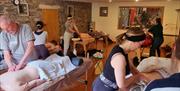 Visitors learning during the Massage Course Retreat with Lake District School of Massage