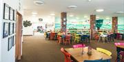 Indoor Seating at Cowshed Café at Walby Farm Park in Walby, Cumbria