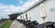 Outdoor Seating at Cowshed Café at Walby Farm Park in Walby, Cumbria