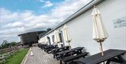 Outdoor Seating at Cowshed Café at Walby Farm Park in Walby, Cumbria