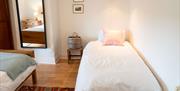 Twin bed in a Family Bedroom at Wayside Cottage 1637 in Whitbeck, Lake District