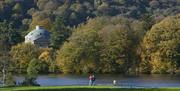 Couple on the Shores of Lake Windermere in the Lake District, Cumbria