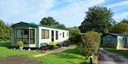 Caravan exteriors at Woodclose Caravan Park in Kirkby Lonsdale, Cumbria