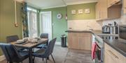 Kitchen and Dining Area at Treetops Self Catering Apartment at Woodclose Park in Kirkby Lonsdale, Cumbria