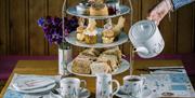 Afternoon Tea spread at the Peter Rabbit Café at The World of Beatrix Potter in Bowness-on-Windermere, Lake District
