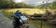 Visitor Using a Tramper Hired from Outdoor Mobility in the Lake District, Cumbria
