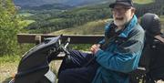 Visitor Using a Tramper Hired from Outdoor Mobility in the Lake District, Cumbria