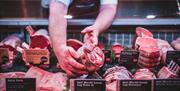 Salt Marsh Lamb in butcher counter at Cranstons Food Hall in Cumbria