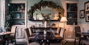 Seating in the dining room at The Black Swan Restaurant in Ravenstonedale, Cumbria