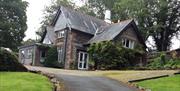 Exterior and Drive at Bowfell Cottage in Bowness-on-Windermere, Lake District