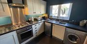 Kitchen at Jasmine Cottage in Kirkby Lonsdale, Cumbria