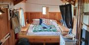 King sized bed at Silva Treehouse at Into the Woods near Little Salkeld, Cumbria