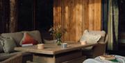 Outdoor seating in Luna Treehouse at Into the Woods near Little Salkeld, Cumbria
