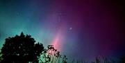 Aurora seen in dark skies over Mosedale End Farm B&B and Glamping Pod in the Lake District, Cumbria