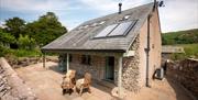 Exterior and patio seating at Ellenboro House in Newton-in-Cartmel, Lake District