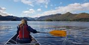 Visitor canoeing with Newlands Adventure Centre in the Lake District, Cumbria