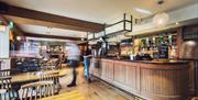 Bar and dining room seating at Pooley Bridge Inn in the Lake District, Cumbria