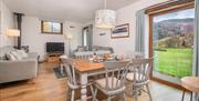Dining and living space at Rigg Barn at Fornside Farm Cottages in St Johns-in-the-Vale, Lake District © Jo Crompton Photography