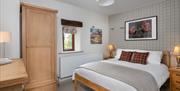 Double bedroom at Rigg Barn at Fornside Farm Cottages in St Johns-in-the-Vale, Lake District © Jo Crompton Photography