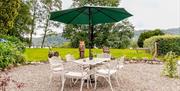 Outdoor seating with lake views at Dorothy's Place in Bowness-on-Windermere, Lake District