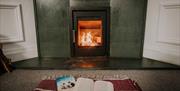 Living Room with fireplace at The Pheasant Lodge near Grange-over-Sands, Cumbria