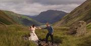Photo of a couple in a scenic Lake District location with Anna Bailey Photography