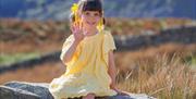 Photo of a child in a scenic Lake District location with Anna Bailey Photography