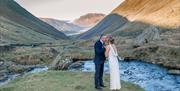 Bridal couple, photographed in the Lake District, Cumbria by Fellside Weddings Photography