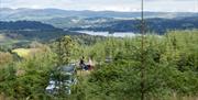 Visitors overlooking Lake District scenery with Graythwaite Adventure in the Lake District, Cumbria